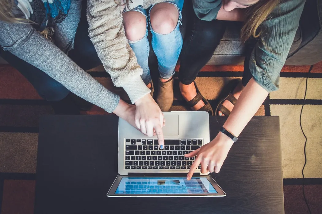 Group of person using laptop