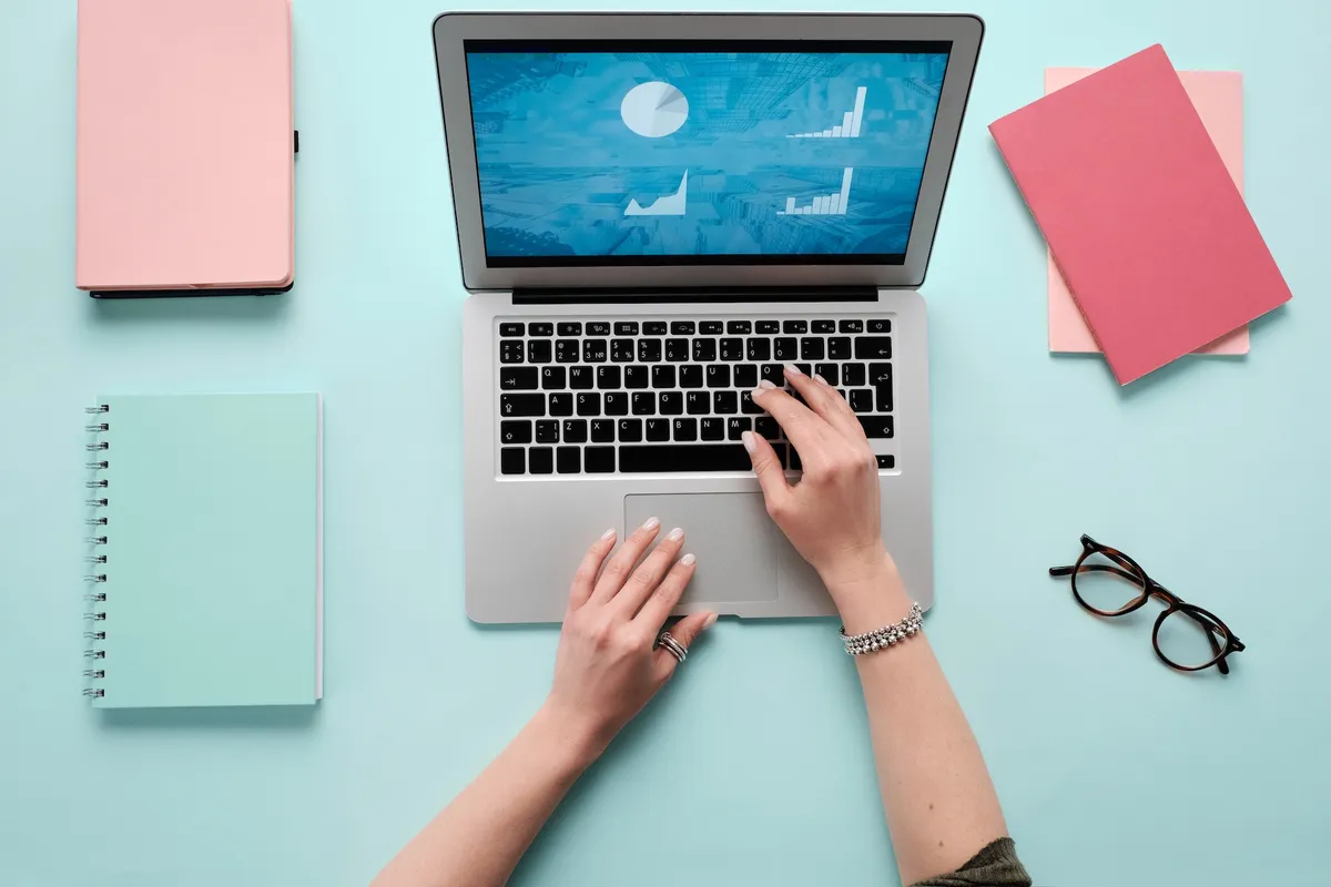 Real estate agent using a computer to check the lead generation of her website