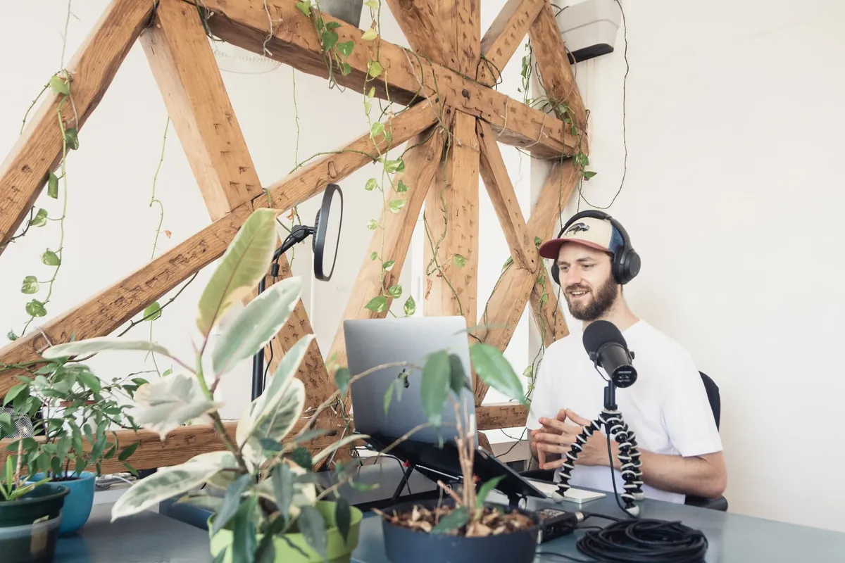 A real estate professional hosting his weekly audio podcast