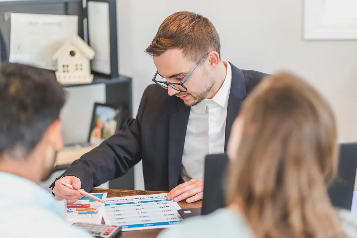 Realtor reviewing a commercial real estate contract before presenting it to clients