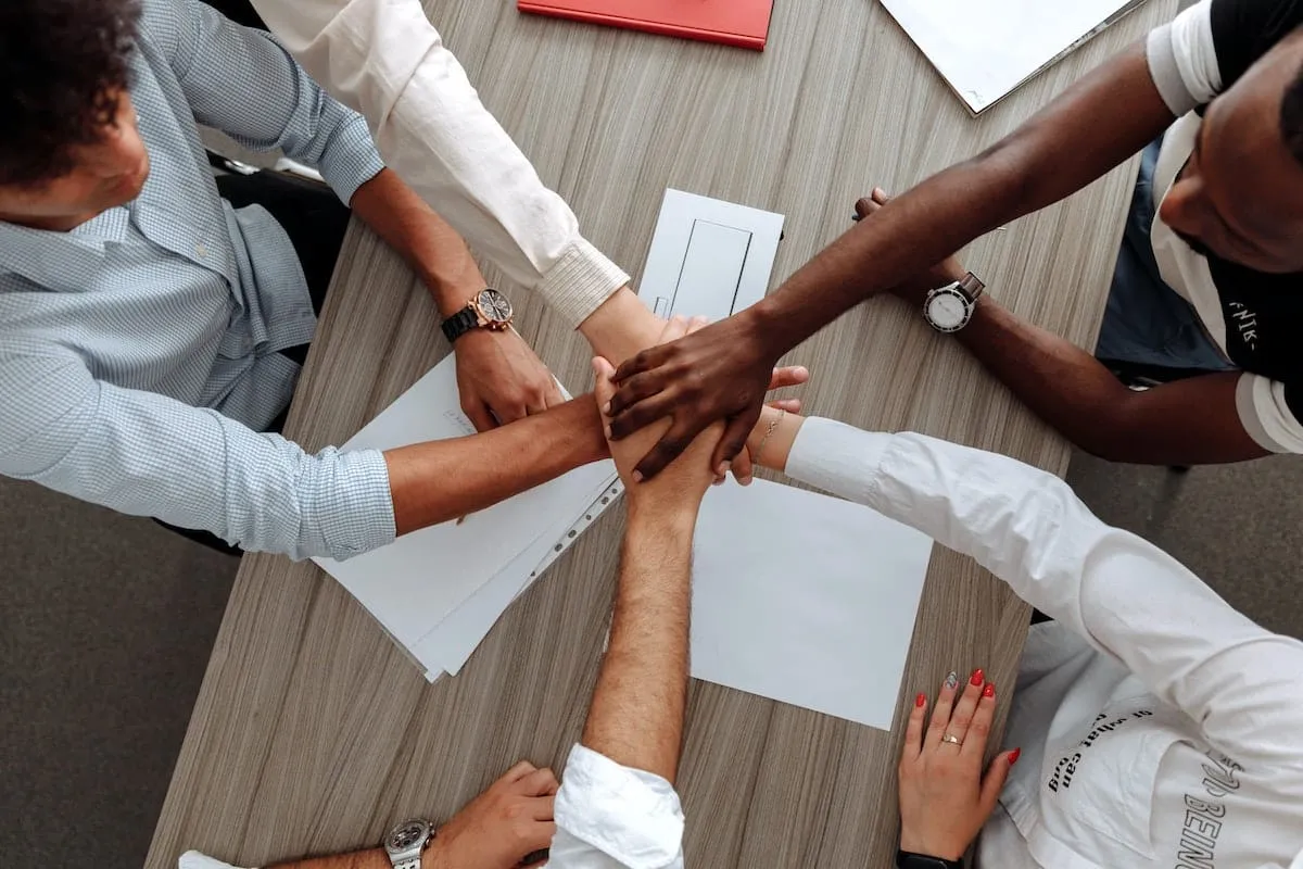 A team of people working together to secure real estate leads. 