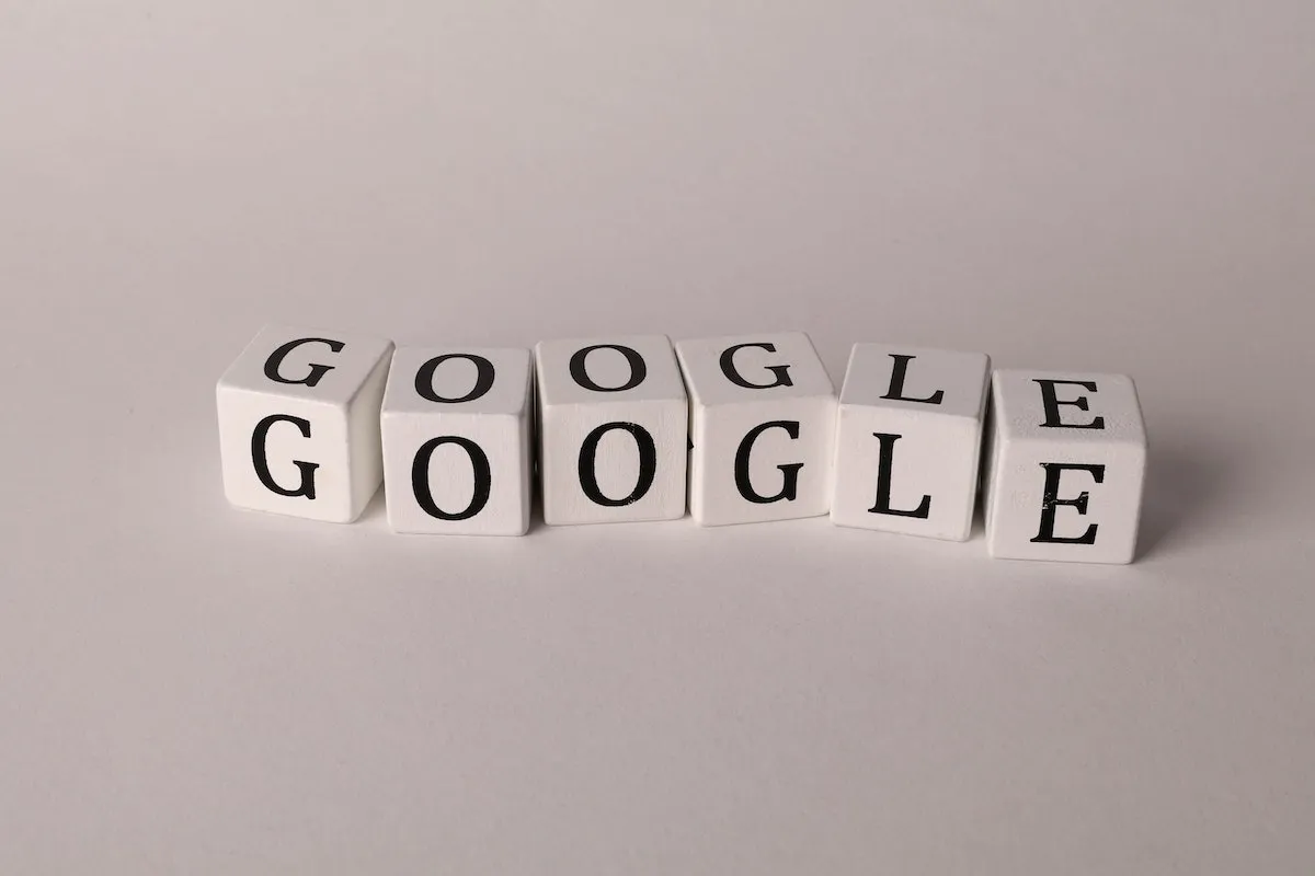 Letter cubes spelling Google on a desk