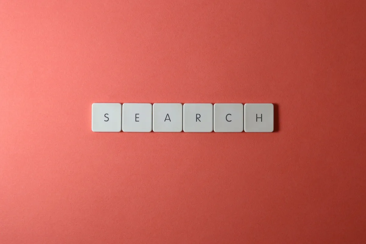 SEARCH written over a red background