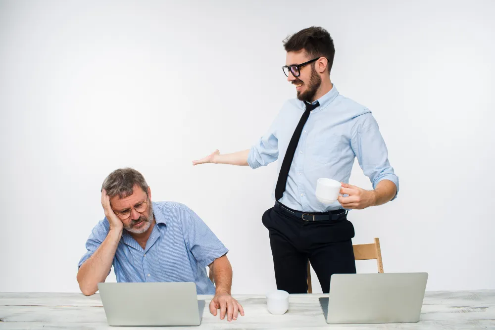the two colleagues working together at office on white background