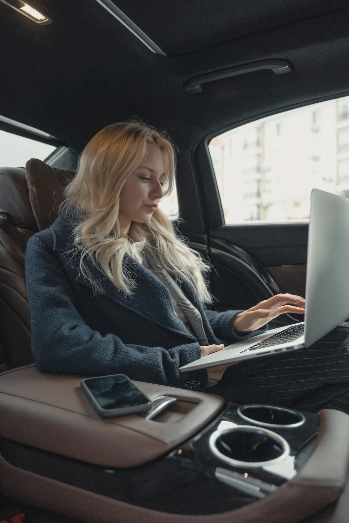 High-end potential buyer browsing for luxury real estate agents.