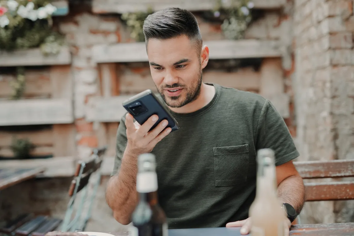 Man using conversational keywords in his voice search query.