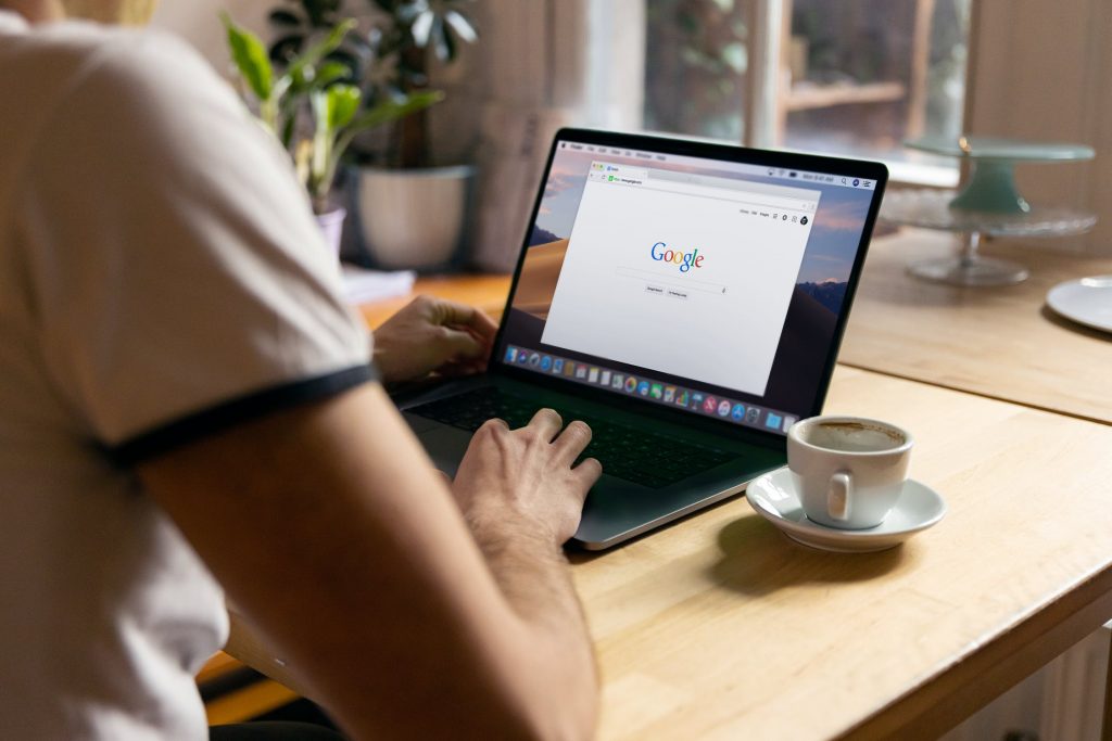 a person using google on his laptop